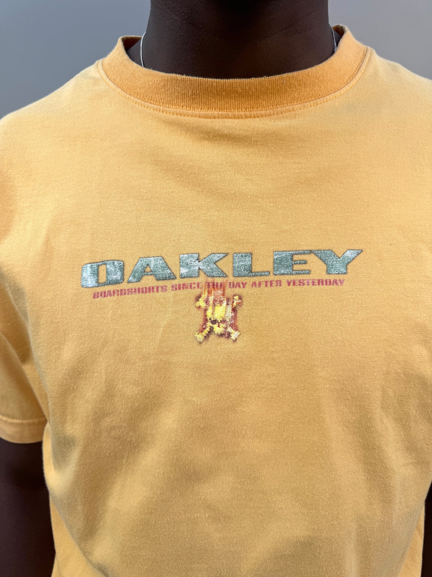 Early 2000’s Oakley Muted Yellow Graphic Tee