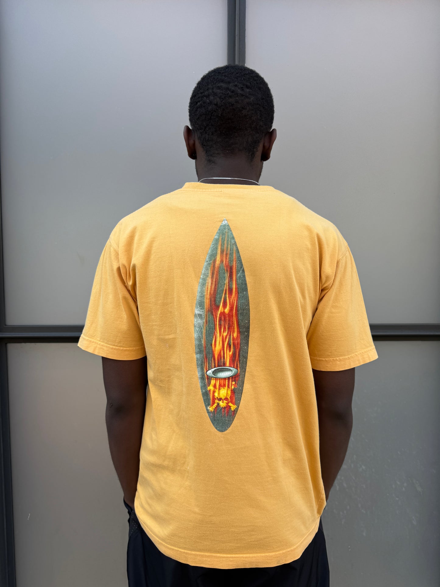 Early 2000’s Oakley Muted Yellow Graphic Tee