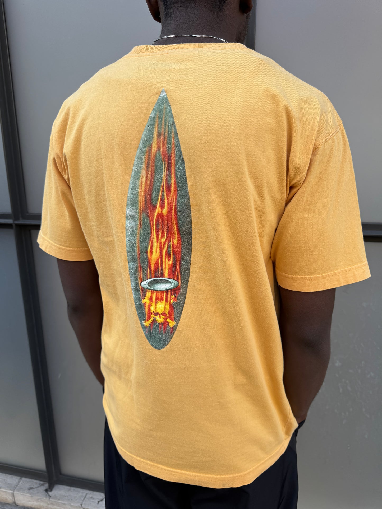 Early 2000’s Oakley Muted Yellow Graphic Tee