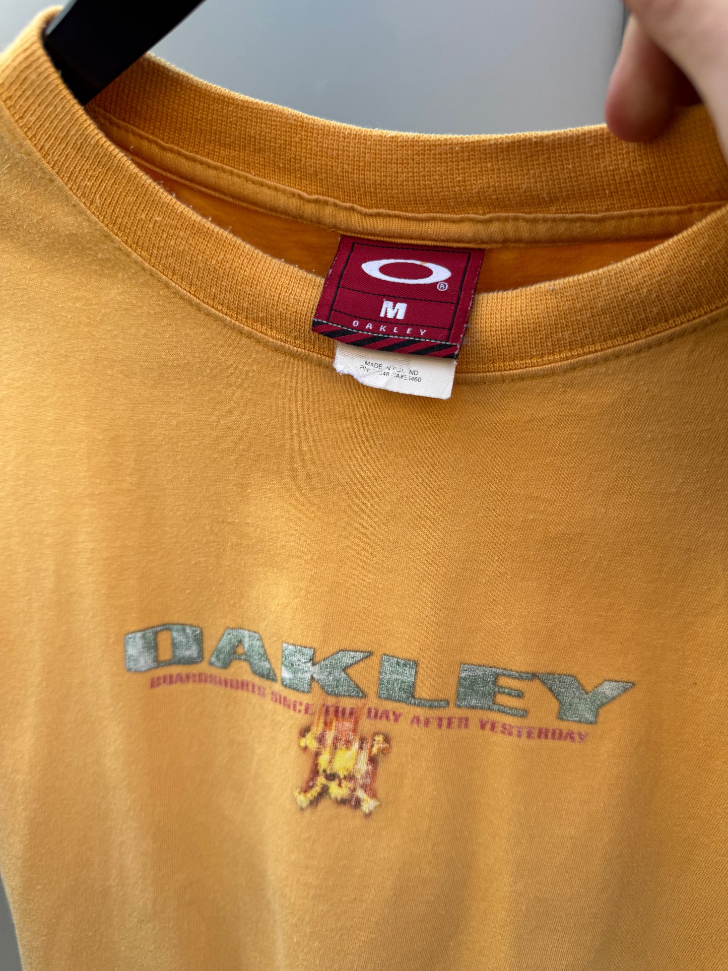 Early 2000’s Oakley Muted Yellow Graphic Tee