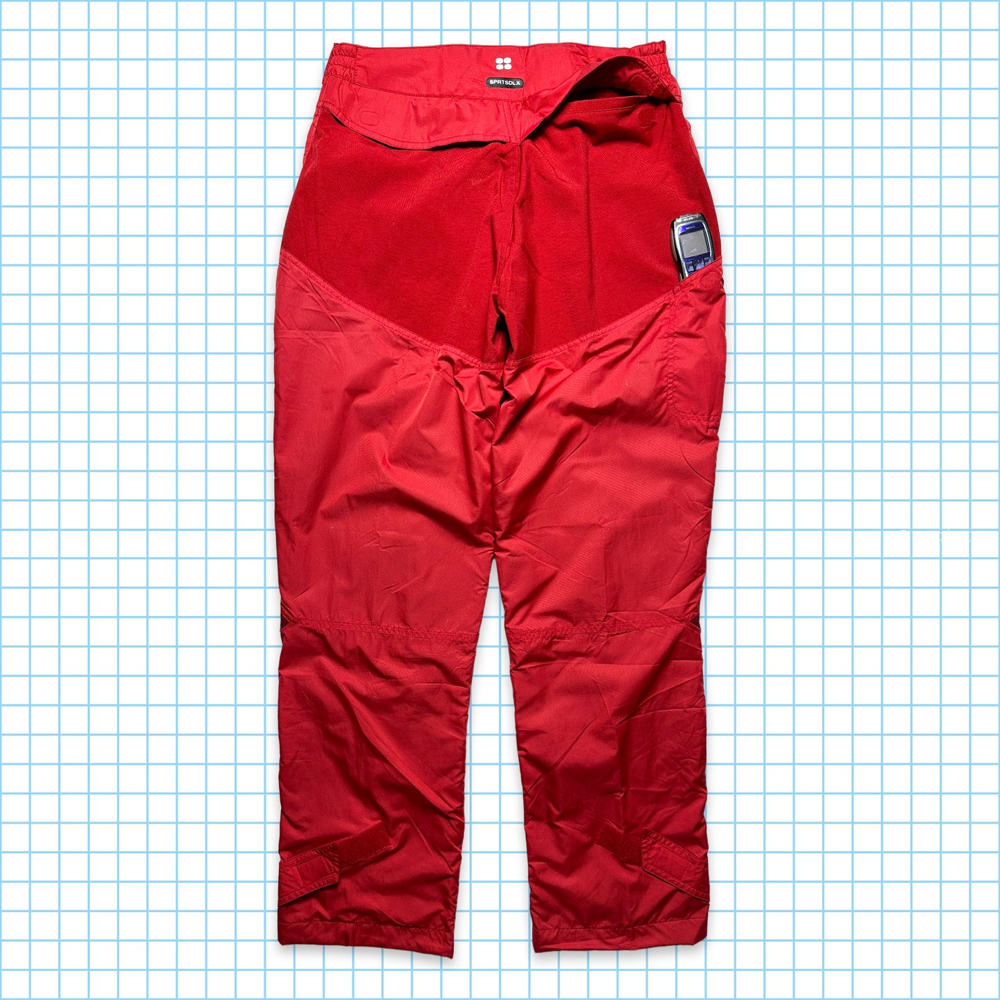 Nike SPRTSDLX Pantalon de survêtement à panneaux rouges - Taille 32-36"