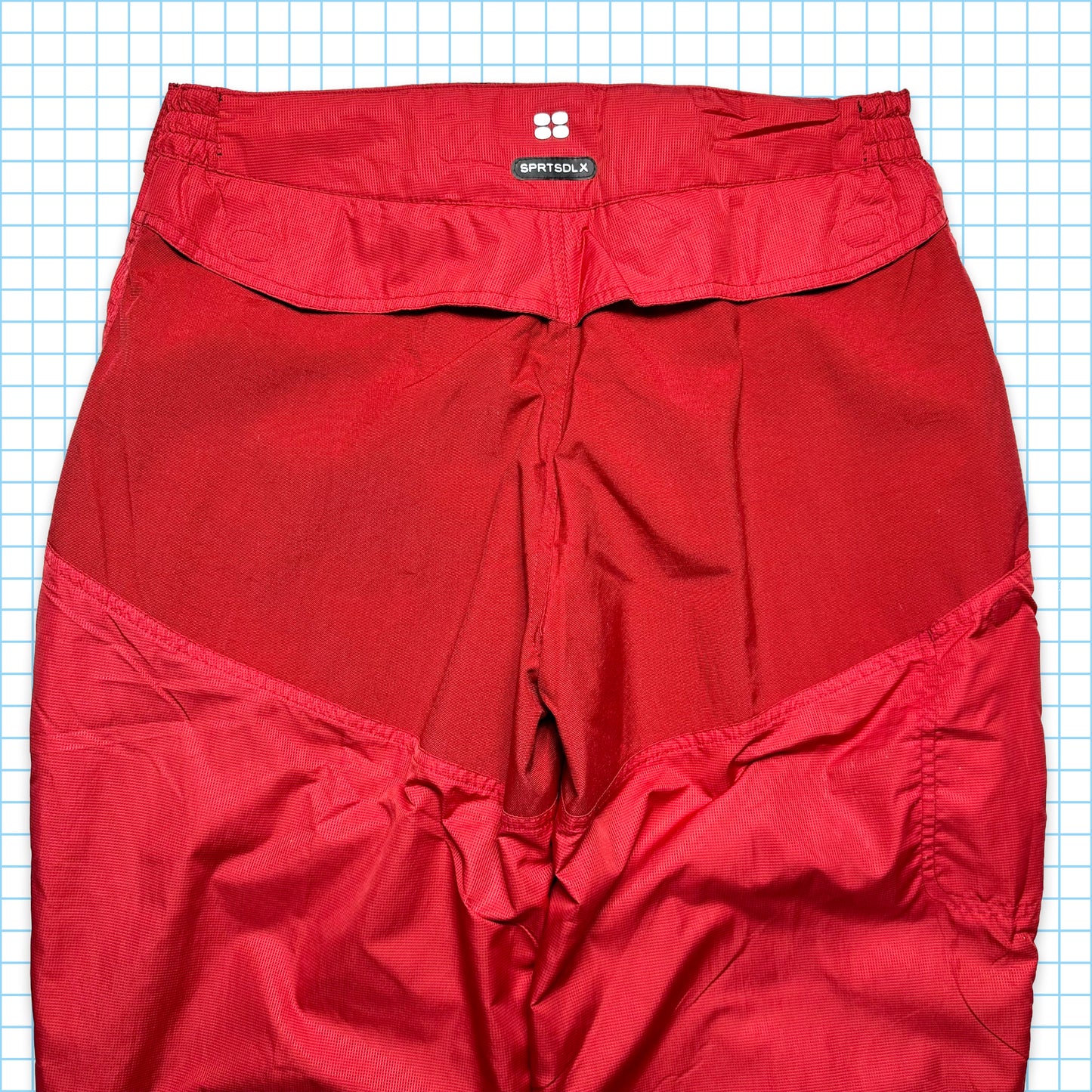 Nike SPRTSDLX Pantalon de survêtement à panneaux rouges - Taille 32-36"