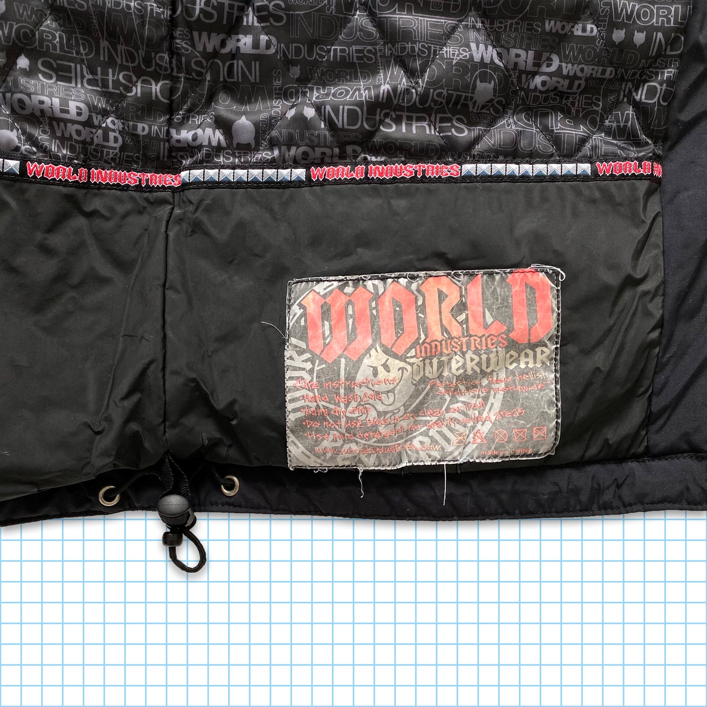 Veste rembourrée World Industries du début des années 00 - Petite / Moyenne
