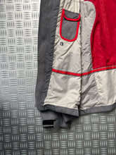 Load image into Gallery viewer, Early 2000’s Nike Padded Inner Bound Seam Tri-Pocket Jacket