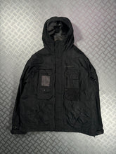 Load image into Gallery viewer, Early 2000’s Oakley Software Jet Black Transformable Front Pocket Jacket