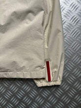 Load image into Gallery viewer, Early 2000’s Prada Sport Ivory Stash Pocket Gore-Tex Jacket