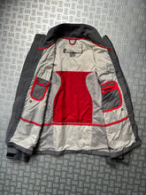 Load image into Gallery viewer, Early 2000’s Nike Padded Inner Bound Seam Tri-Pocket Jacket