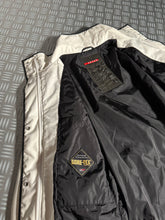 Load image into Gallery viewer, Prada Trompe L’oeil Outline Padded Jacket