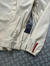 Load image into Gallery viewer, Early 2000’s Prada Sport Ivory Stash Pocket Gore-Tex Jacket