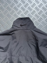 Load image into Gallery viewer, Early 2000’s Nike Padded Inner Bound Seam Tri-Pocket Jacket