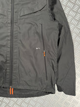 Load image into Gallery viewer, Early 2000’s Nike+ Multi Pocket Technical Ventilated Jacket