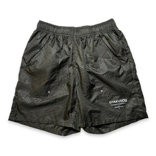 Nike Gyakusou Short à imprimé répété en relief vert foncé - Petit