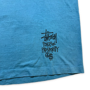 Tee-shirt bleu vif Stüssy Peace and Prosperity des années 1990 - Extra Large