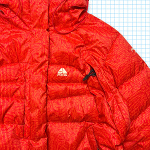 Veste matelassée Nike ACG bicolore rouge avec graphisme complet - Petit / Moyen