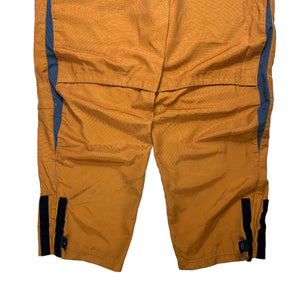 Nike Pantalon technique articulé orange brûlé/gris - Taille 34/36"