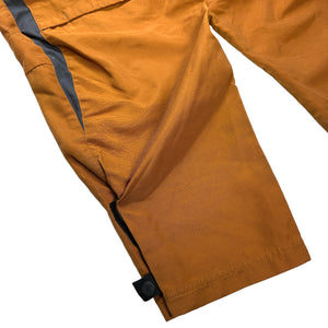 Nike Pantalon technique articulé orange brûlé/gris - Taille 34/36"