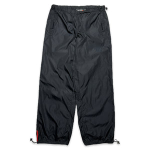 Pantalon coquille en nylon Prada Sport SS99 - Taille 30-34"